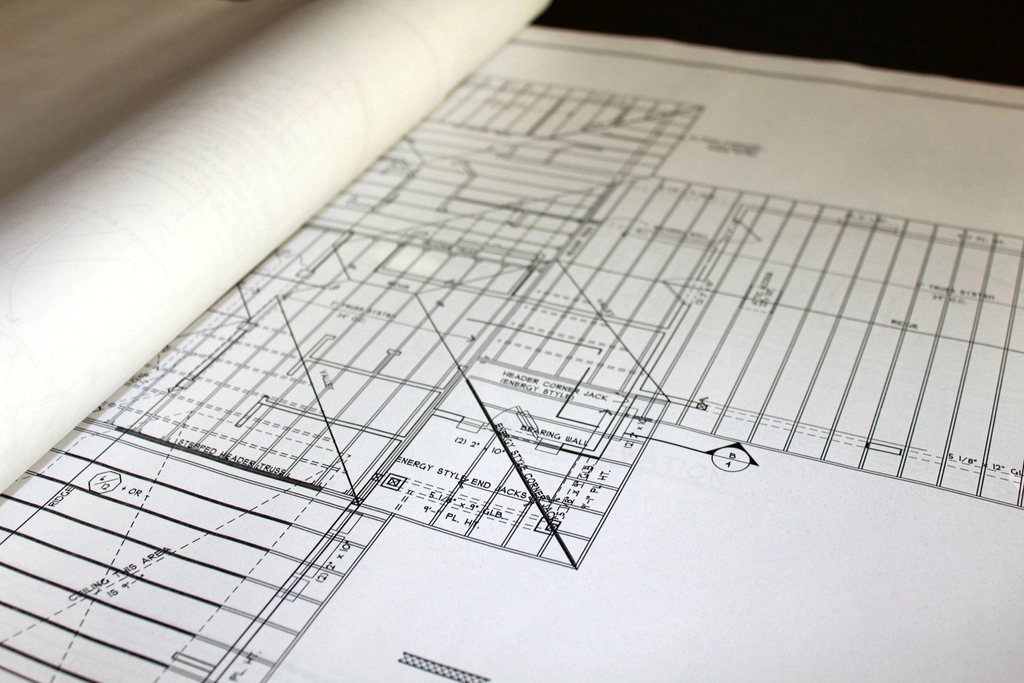 Architectural plans on a desk